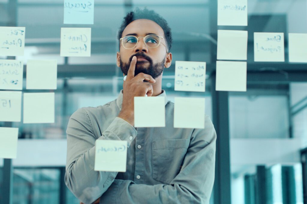 Young businessman brainstorming and planning strategy in a modern office